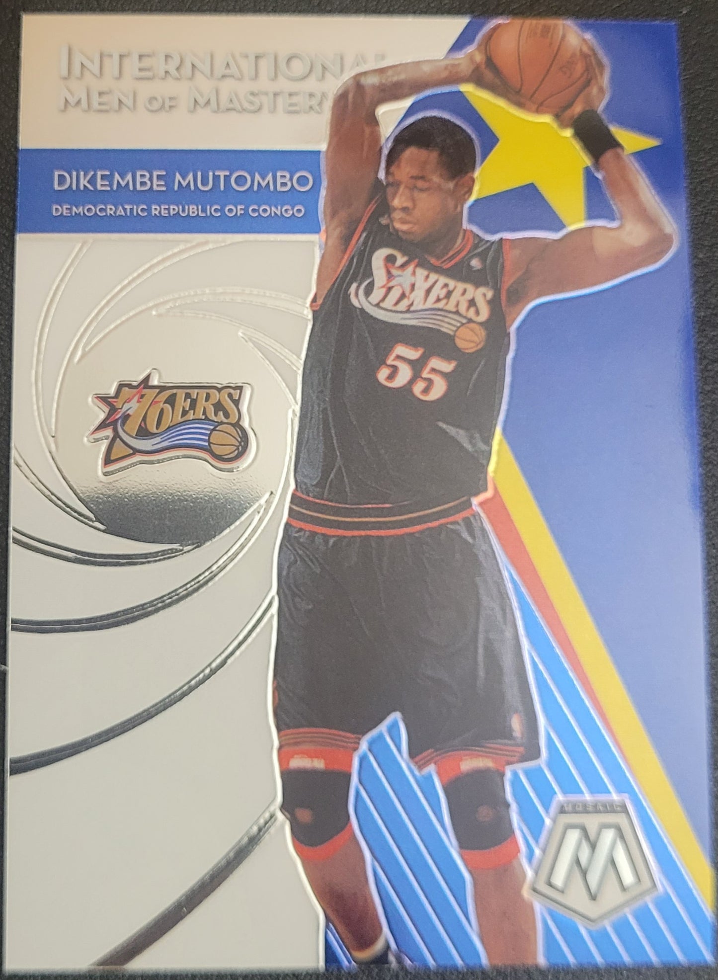 2019-20 Panini Mosaic #12 Dikembe Mutombo International Men of Mastery