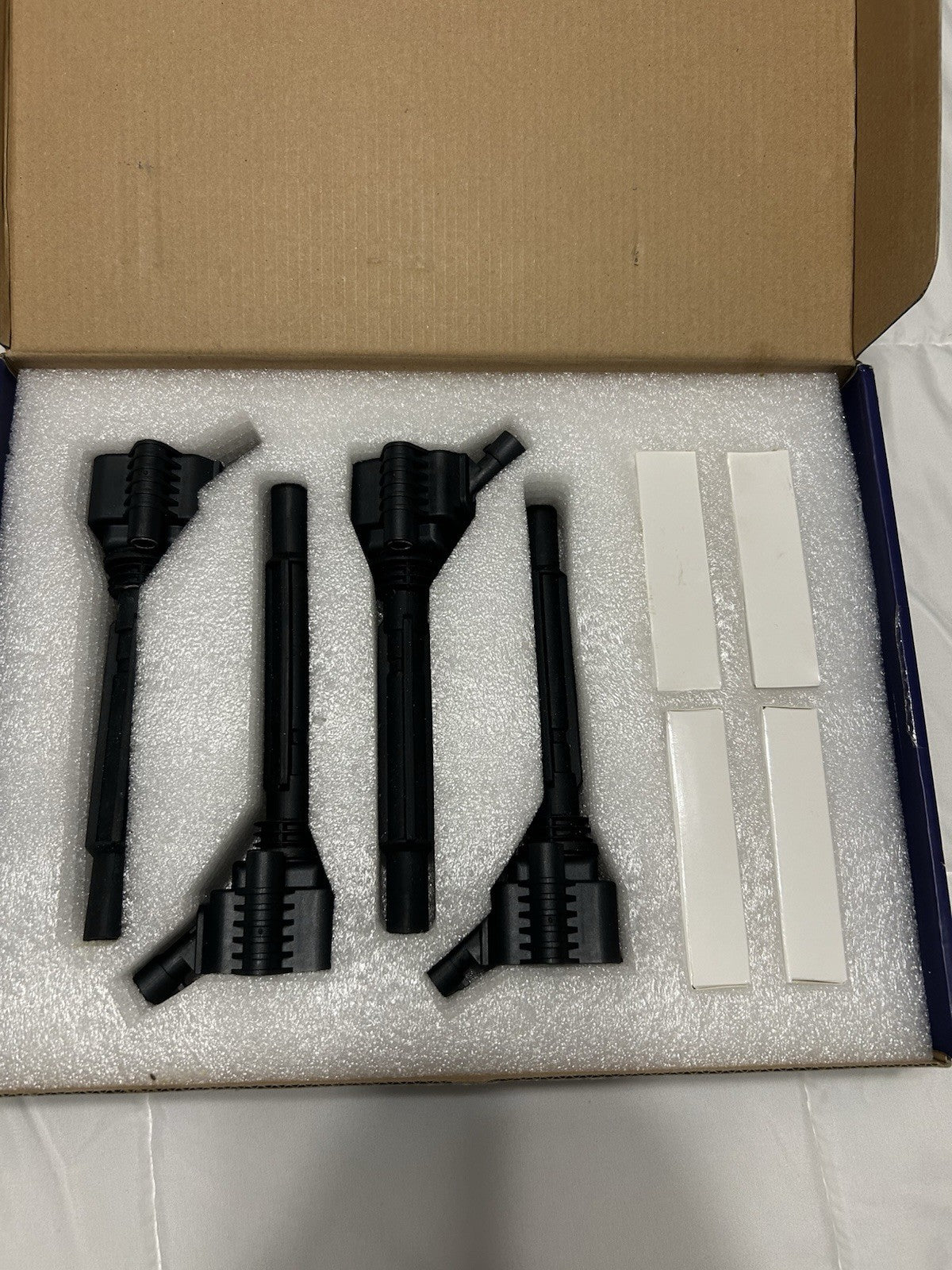 4 Ignition Coils UF673 & 4 Iridium Spark Plugs 93618 - Open Box, NEW!